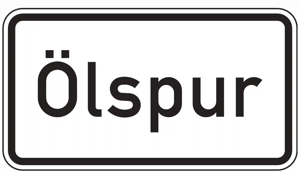 Zusatzzeichen: Ölspur – Rutschgefahr beachten.