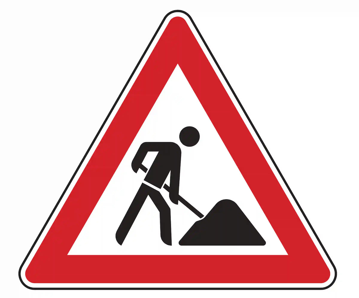 Verkehrszeichen 123: Dreieck mit Bauarbeiter – warnt vor naher Baustelle, Tempo senken.